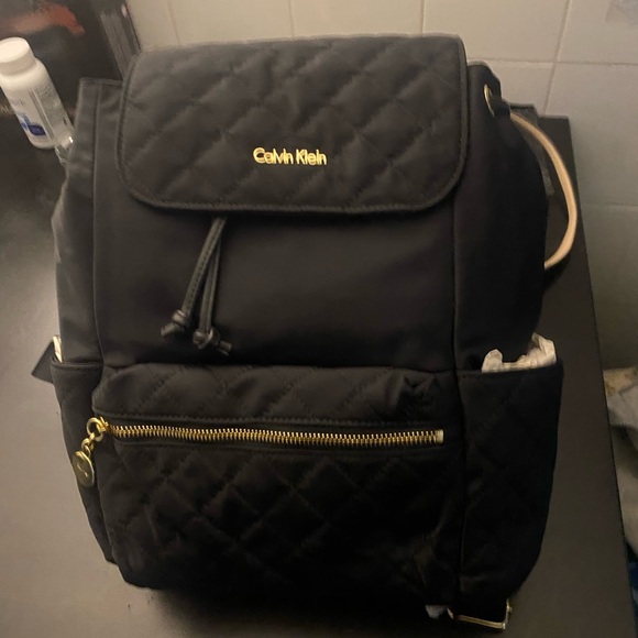 Calvin Klein Black Quilted Backpack with Gold Details - Picture 1 of 1